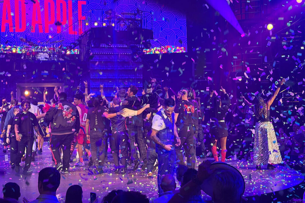 The "Mad Apple" cast departs the stage amid a rain of confetti in the show's finale at New York ...