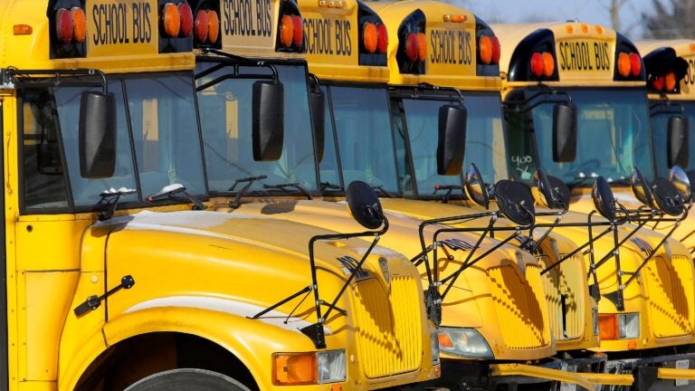 Public school buses are parked in Springfield, Ill.