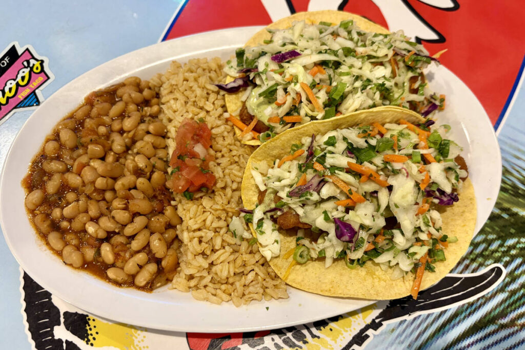 A plate with two fish tacos, rice and beans from Wahoo's Fish Taco in Las Vegas. (Johnathan L. ...