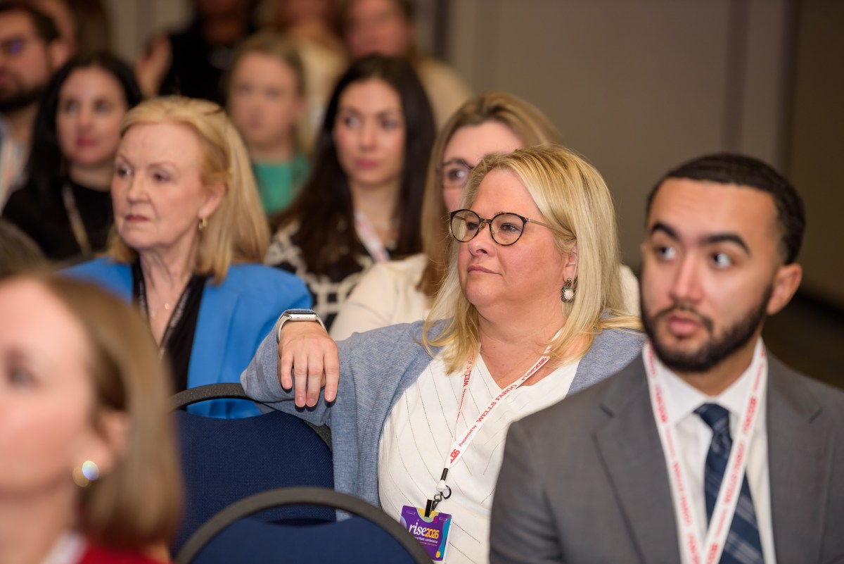 men and women at a Momentum conference in Birmingham, AL